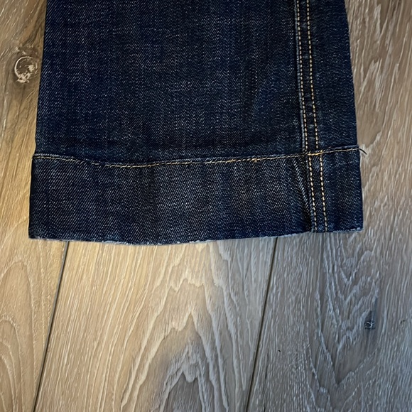 Dark wash low rise Gap 1969 bootcut jeans with flared leg. - Picture 3 of 4